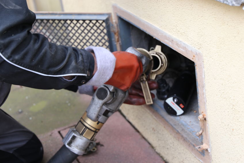 Von Eiff Oil Worker Delivering Home Heating Oil